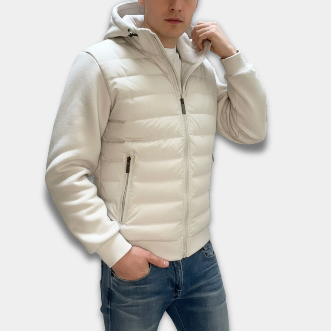 Person wearing a white puffer jacket on a white background