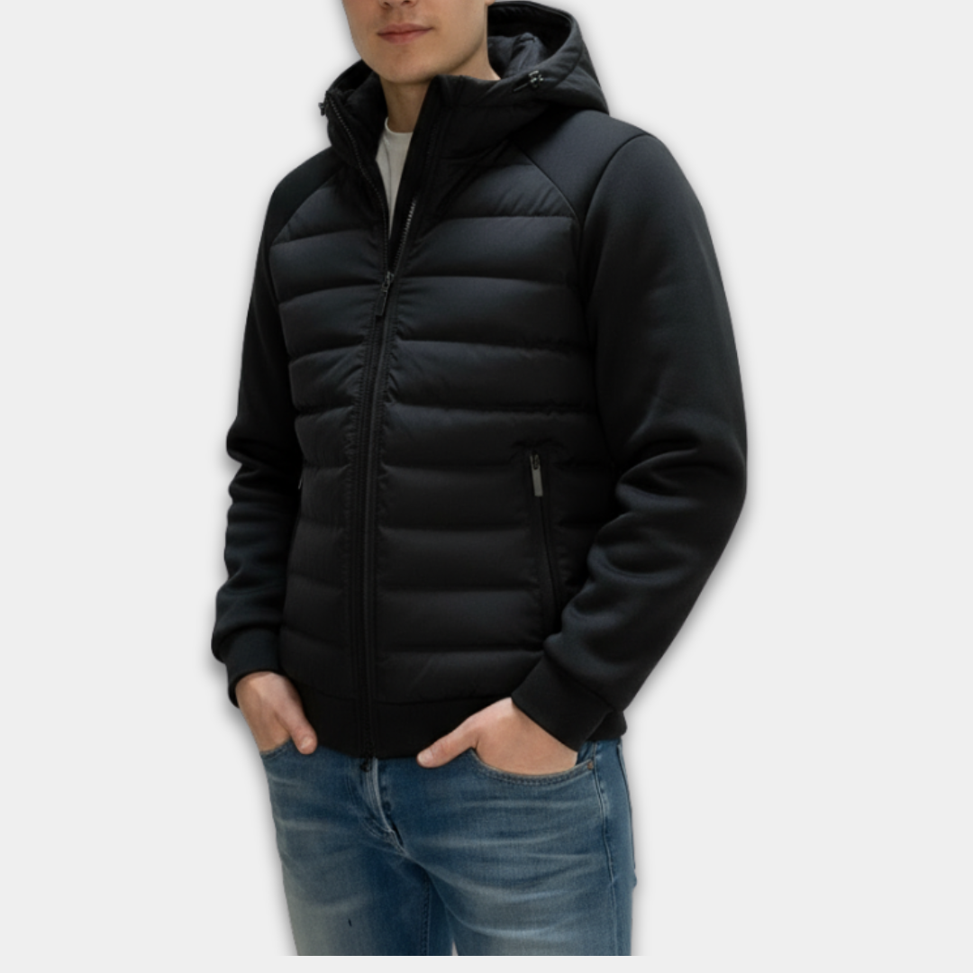 Person wearing a black puffer jacket on a white background