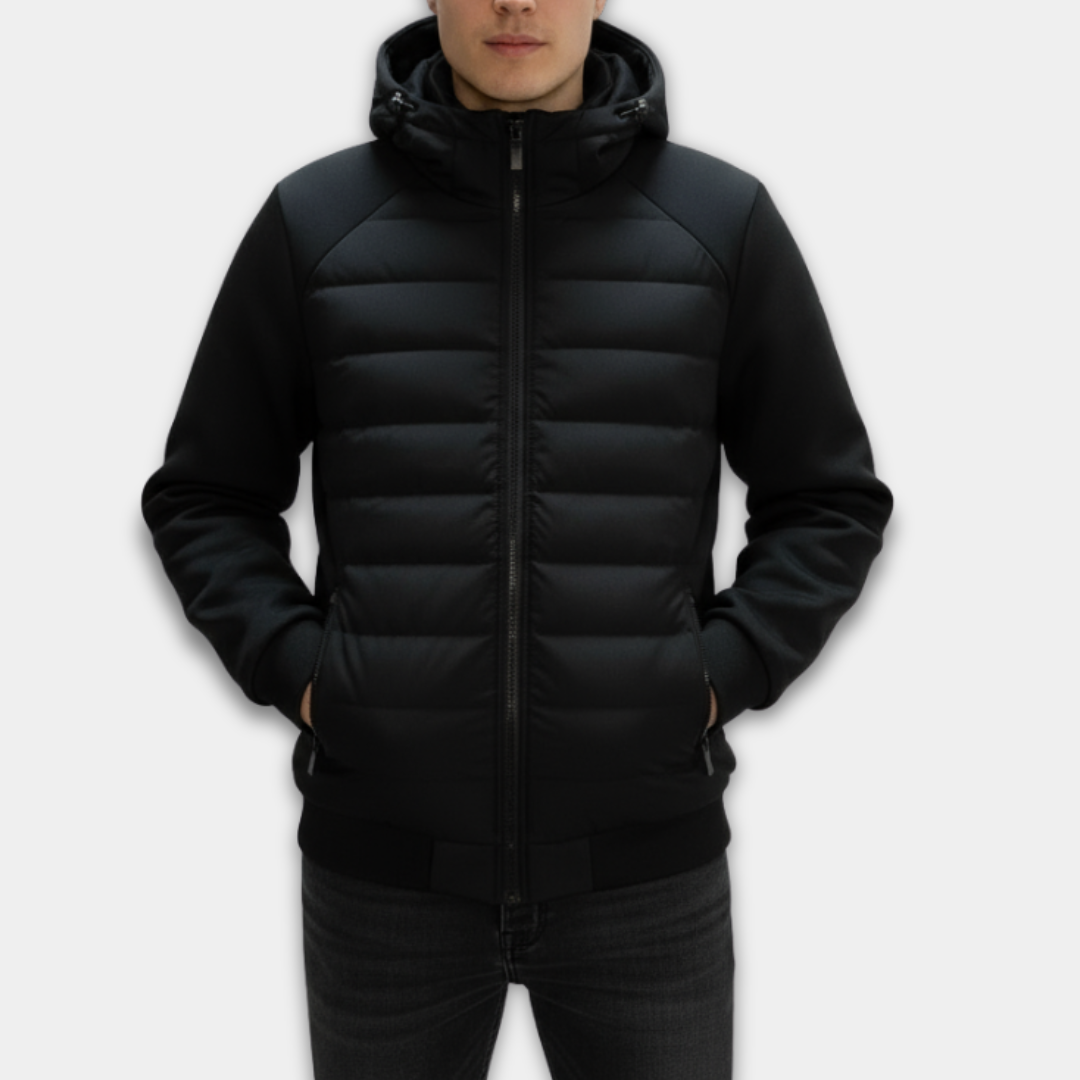 Person wearing a black puffer jacket on a white background