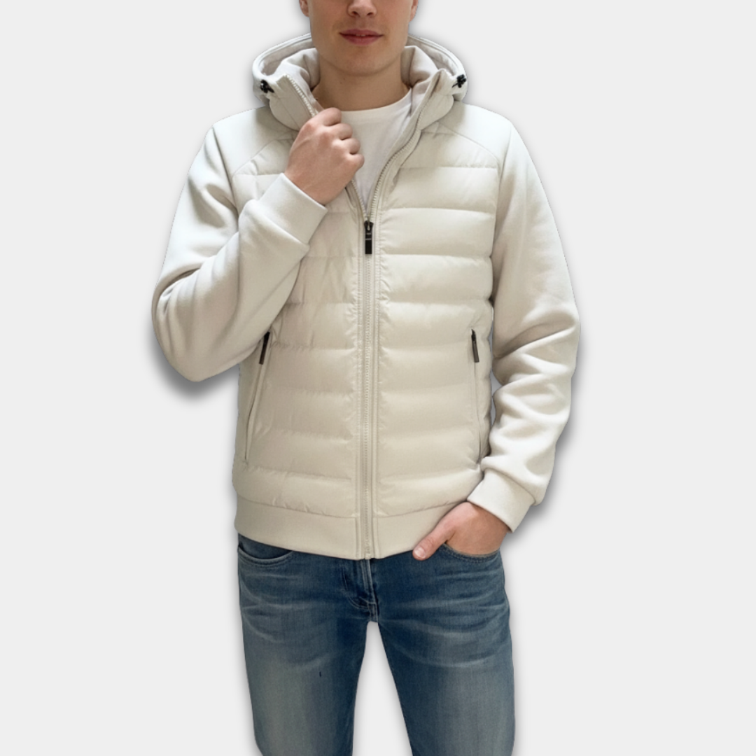 Person wearing a white puffer jacket on a white background